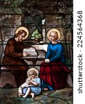 Stained glass window depicting the Holy Family, St. Joseph, Blessed Virgin Mary and the child Jesus