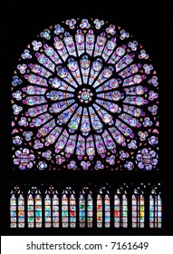 Stained Glass Window In Notre Dame Cathedral, Paris, France

