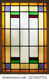 stained glass window in wood frame