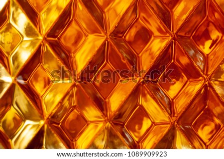 Stained glass window. Yellow pattern background