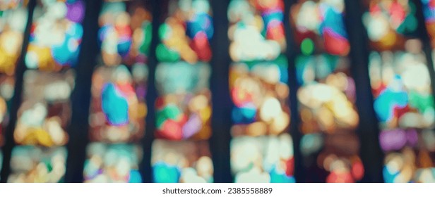 Stained glass windows art in church. Blurred cathedral background. - Powered by Shutterstock