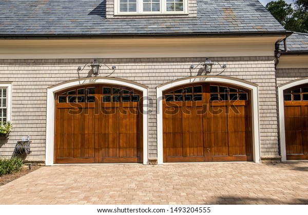 Stained Wood Custom Triple Garage Doors Stock Photo Edit Now