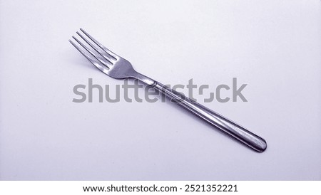 Stainles fork on the white background