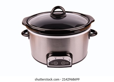 Stainless Crock Pot Isolated On A White Background. Cut Out.