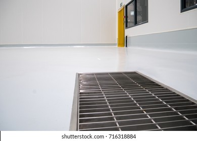 Stainless Grating Cover On Epoxy Floor Food Process Factory Warehouse Construction Site