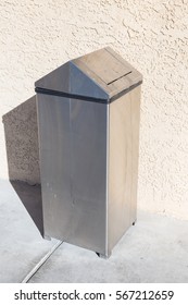 Stainless Stee Trash Against The Wall