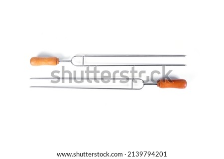 Stainless steel BBQ skewers  isolated on white background