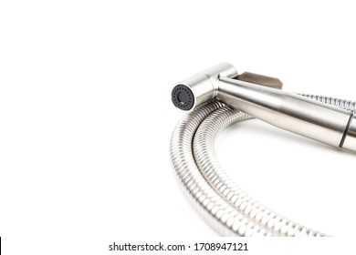 Stainless steel Bidet shower or a hand-held bidet for anal cleansing after using the toilet for defecation and urination. It is popular for use in Asian areas. On white background and have copy space.