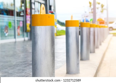 Stainless Steel Bollard Barriers In Front A Shop Prevent People For Security.