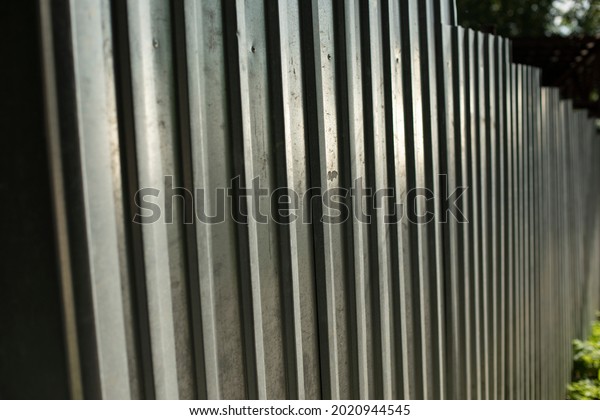 Stainless steel fence. Fencing of the\
territory. Fence around the construction\
site.