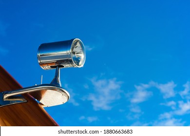 Stainless Steel Floodlight On The Yacht Hull Close-up.