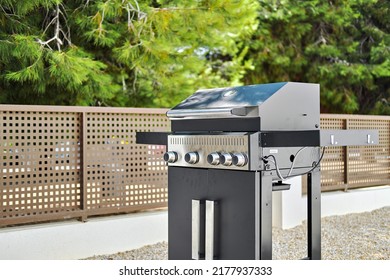 Stainless Steel Gas Grill Bbq Barbecue In Backyard Of Private Residential Home. Cooking Meat, Fish, Vegetables In Summertime Gatherings, No People