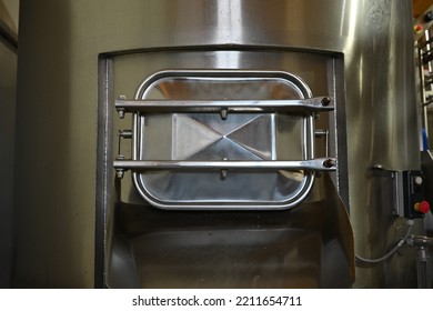 Stainless Steel Hatch In A Large Metal Barrel