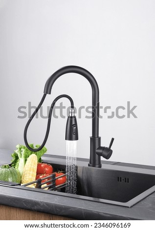 Stainless steel kitchen faucet, indoor kitchen scene, gradient color background, stereo photography light