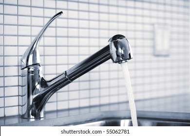 Stainless Steel Kitchen Faucet And Sink With Running Water