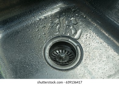 A Stainless Steel Kitchen Sink Drain