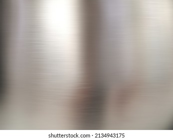 Stainless steel large sheet  With light hitting the surface,Inside passenger elevator,Reflection of light on a shiny metal texture,stainless steel background,metal texture background. - Shutterstock ID 2134943175