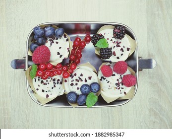 Stainless Steel Lunch Box With Muffins For Breakfast.