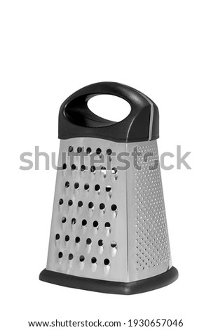 Stainless steel metal food grater. Isolated on white background 