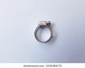 Stainless Steel Metal Hose Clamp isolated on a white background. Ideal tool for plumbers, construction workers and household repairing, gas or water hose clamp tool - Powered by Shutterstock