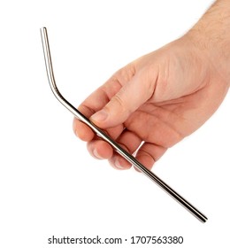 Stainless Steel Metal Straw In Hand On A White Isolated Background. Showing Subject On A White Background.