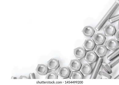 Stainless Steel Nuts And Bolts With Copy Space For Your Text On Plain Background