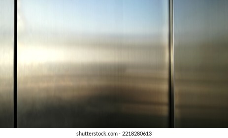 stainless steel panel with light reflection on texture,metal shiny background. - Shutterstock ID 2218280613