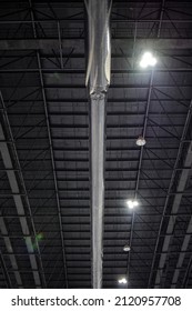 Stainless Steel Pipe On The Ceiling. Straight Air Duct In Factory.