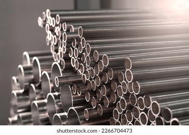 Stainless steel pipes in an industrial warehouse - Shutterstock ID 2266704473