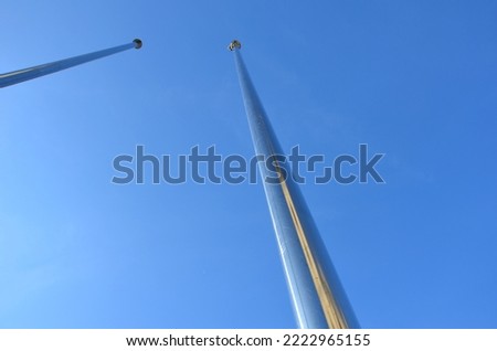 stainless steel pole for hanging the flag. top view of the shiny stainless steel pole. firefighters use similar pipes to quickly move between floors of the fire station