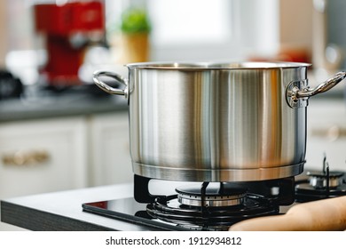 Stainless Steel Pot On A Gas Stove In Kitchen Close Up