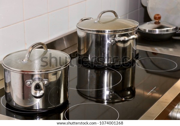 Stainless Steel Pots Pans On Modern Stock Photo Edit Now 1074001268