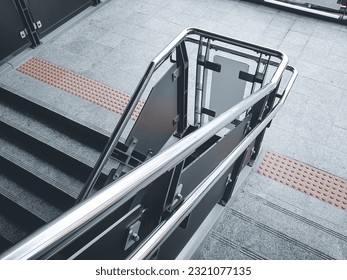 Stainless steel railing at station. Fall Protection.  - Shutterstock ID 2321077135