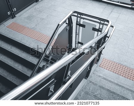 Stainless steel railing at station. Fall Protection. 
