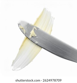 Cuchillo de mesa de acero inoxidable con mancha de mantequilla sobre fondo aislado