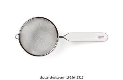 Stainless Steel Tea Strainer With Plastic Handle Isolated On White Background. Fine Mesh Sieve With Hanging Ear Top View. Modern Kitchen Utensils For Food Design. Studio Shot. Close-up.