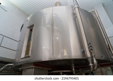 A Stainless Steel Vat In The Food Industry At A Brewery In The Process Of Brewing Beer. Background With Selective Focus And Copy Space For Text