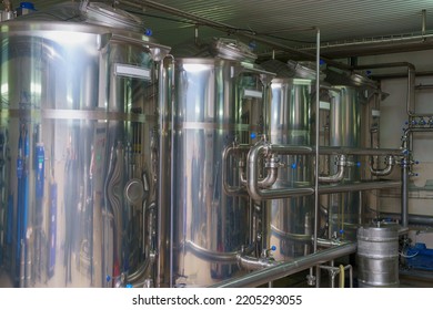 A Stainless Steel Vat In The Food Industry At A Brewery In The Process Of Brewing Beer. Background With Selective Focus And Copy Space For Text