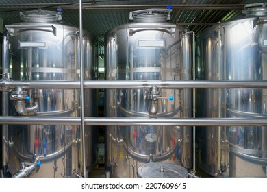 A Stainless Steel Vat In The Food Industry At A Brewery In The Process Of Brewing Beer. Background With Selective Focus And Copy Space For Text