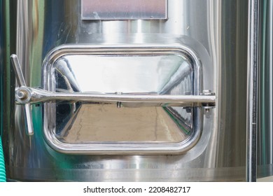 A Stainless Steel Vat In The Food Industry At A Brewery In The Process Of Brewing Beer. Background With Selective Focus And Copy Space For Text