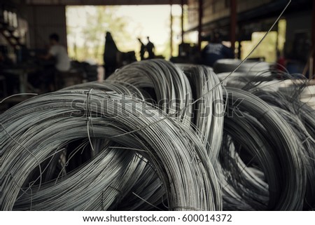 Stainless Steel wire Rolls in construction site.Closeup of Metal Steel reinforced rod for concrete in store.Construction Concept.