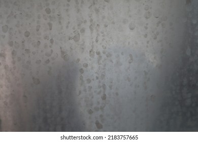 Stains dirty are caused by water droplets on the shower enclosure glass.