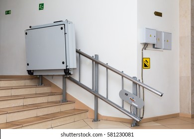 Stair lift for the disabled. Stairs of public building.