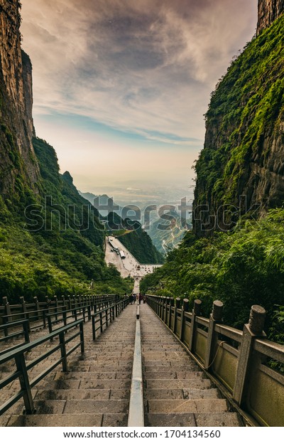 Staircase of 999 steps to Heaven\'s\
Gate natural arch at Tianmen Mountain, Zhangjiajie,\
China