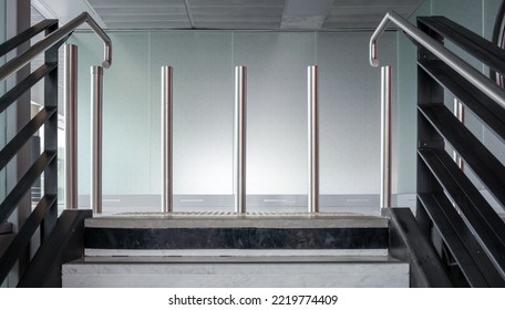 Staircase At The Airport With Barrier. Modern Design In Black, Grey, White And Metallic Silver. No People