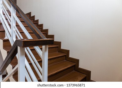 Staircase Custom Built Home Interior With Wood Staircase And White Walls. Copy Space Background