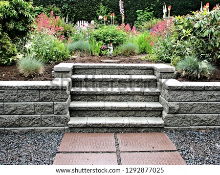 staircase exterior closeup steps gray concrete block retaining wall garden landscape hardscape