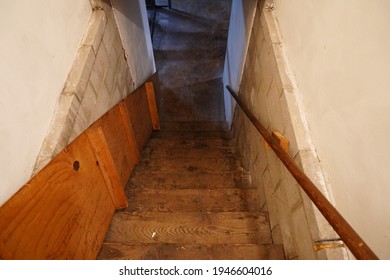 Staircase Hallway Leading Into A Basement Of An Apartment.