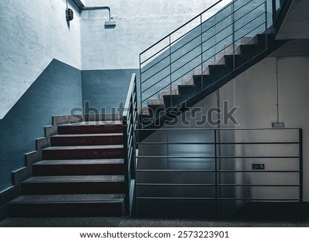 Similar – Image, Stock Photo Industrial warehouse staircase with a glimpse of neon light