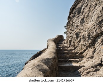 Staircase In The Mountains. The Steps Are Made From A Mountain Range. Golitsyn Trail In The Crimea. Mountain Range Above The Sea. Warm, Summer Day. Blue Sky. Horizontally. Travel Concept. No People.